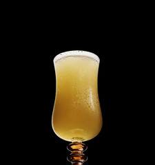 craft wheat beer on a black background