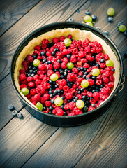 Wild berry pie with raspberries and blueberries