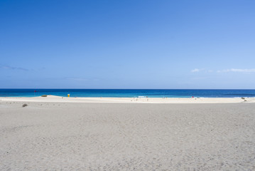 White sandy beach with turquoise water on the island Fuerteventu