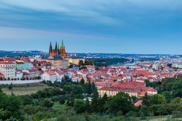 Evening summer Prague panorama from Prague Hill with Prague Castle, Vltava river and historical...