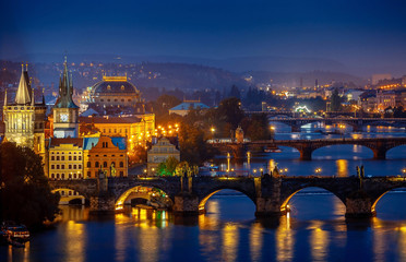 Fototapeta na wymiar Evening over river Vltava near Charles bridge in Prague