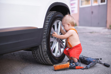 Little boy car mechanic