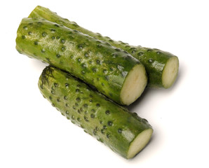salted cucumber on white, traditional snack while drinking vodka