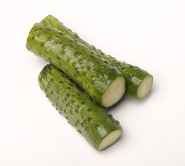 salted cucumber on white, traditional snack while drinking vodka