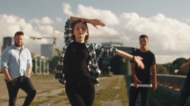 Teenage Girl Performing Modern Dance Outdoors in Urban Environment. Shot on RED Cinema Camera in 4K (UHD).