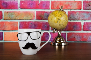 Coffee cup with a black hipster mustache
