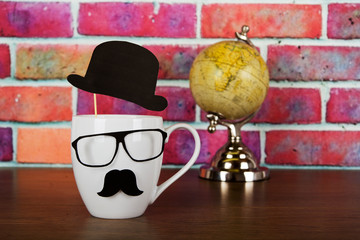 Coffee cup with a black hipster mustache