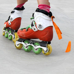 girl turning while skating with cones