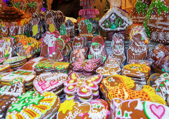Fototapeta na wymiar Colorful gingerbread stall with icing in Riga Christmas Market
