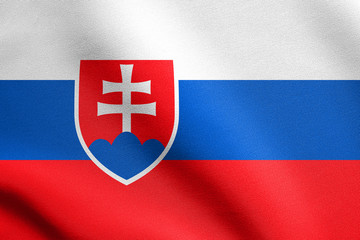 Fototapeta premium Flag of Slovakia waving with fabric texture