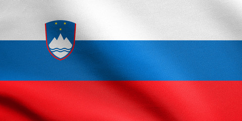 Fototapeta premium Flag of Slovenia waving with fabric texture