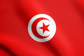 Obraz premium Flag of Tunisia waving with fabric texture