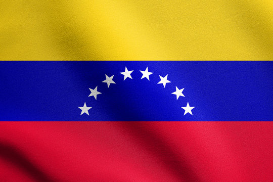 Flag of Venezuela waving with fabric texture