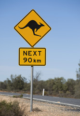 road sign kangaroos next 90km