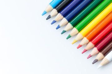 Colored pencils on a white background.