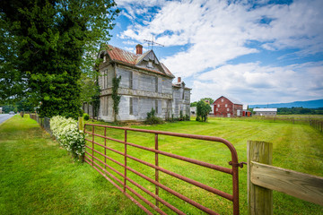Fence and abandoned house in Elkton, in the Shenandoah Valley of