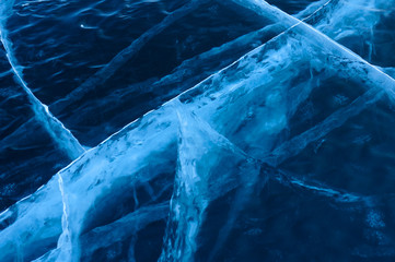 Winter. Extremal cracks on Ice of Lake Baikal. thickness of about one meter. . Ice storm. Used toning of the photo. 