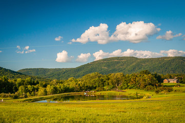 Pond and view of distant mountains in the rural Shenandoah Valle