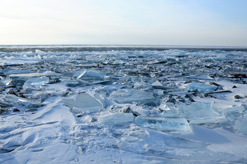 Winter. Extremal cracks on Ice of Lake Baikal. thickness of about one meter. . Ice storm. Used toning of the photo. 
