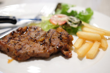 Grilled pork steak