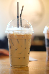 Cold coffee refreshment drink on wood desk