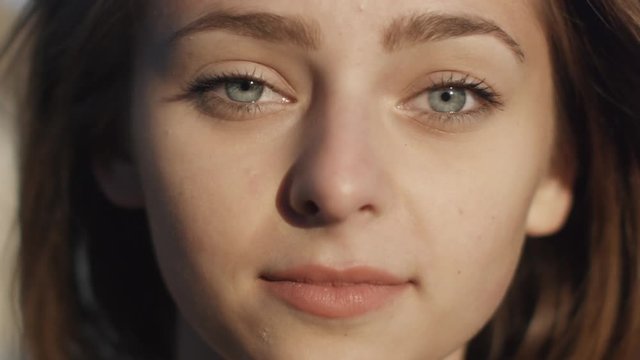 Portrait of Attractive Young Girl Looking at Camera. Shot on RED Cinema Camera in 4K (UHD).