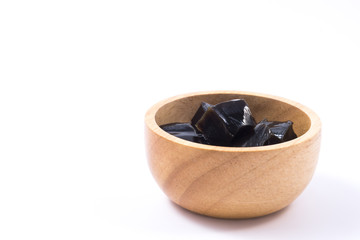 Grass jelly in wooden bowl