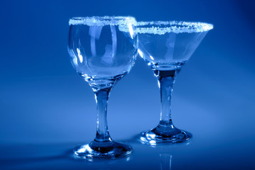 Wine glass close-up, decoration on the edge of a white crumb