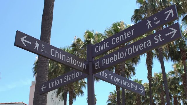 Downtown Los Angeles street sign showing directions to the Los Angeles Union Station, Civic Center, El Pueblo, Chinatown, Little Tokyo and LA Arts District 