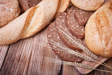 Fresh bread and ears of ripe wheat