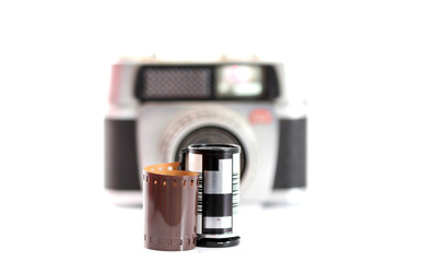 vintage camera film roll on white background