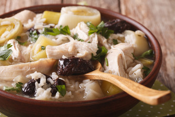 Scottish chicken soup with leeks and prunes macro. Horizontal
