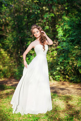Fototapeta na wymiar Beautiful woman in a wedding dress