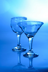 Wine glass close-up, decoration on the edge of a white crumb