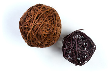 decorative wicker wooden balls on a white background