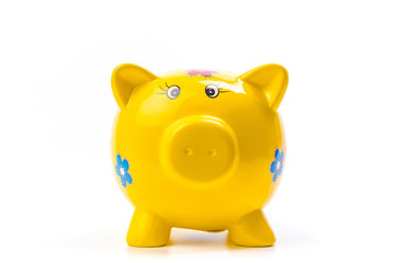 yellow piggy bank isolated on white