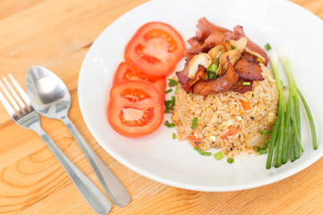Close up fried rice with bacon and vegetables