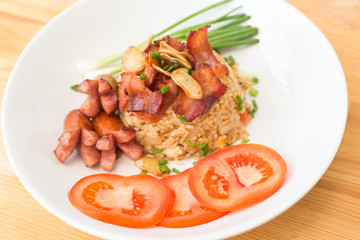 Close up fried rice with bacon and vegetables