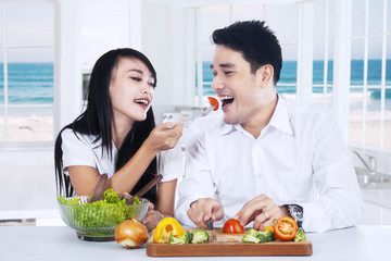 Young couple preparing healthy food