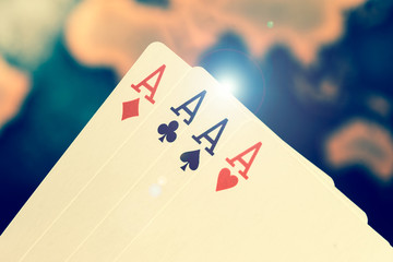 Gambling image, playing cards, with lens flare