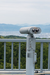 Coin Operated Binocular viewer looking out to Landscape with bea