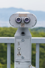 Coin Operated Binocular viewer looking out to Landscape with bea