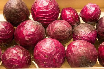 Fototapeta na wymiar Fresh red cabbage background - purple cabbage in market place