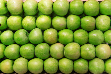Green Apple Background at open air market