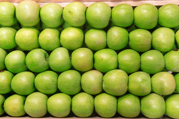 Green Apple Background at open air market