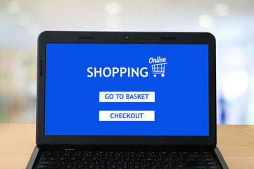 Laptop with shopping online device on screen