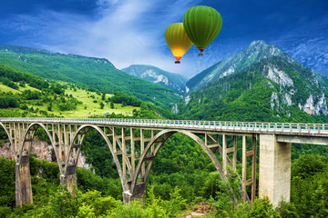 Mountain landscape, Montenegro. Durdevica Tara arc bridge in the - obrazy, fototapety, plakaty