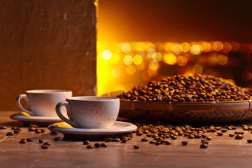 Cup of black coffee and  beans