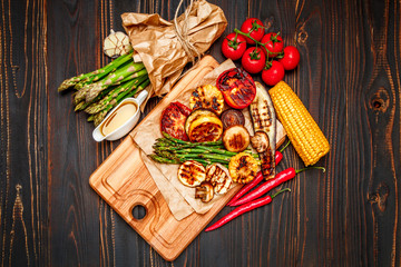 grilled vegetables on wooden table