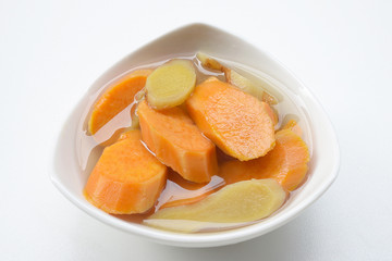 Asian dessert soup. Sweet potato soup boiled with ginger
